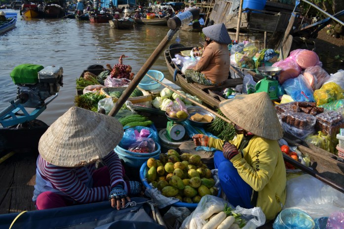 can-tho-delta-mekong-marche-flottant-fruit-commerce-noworries.jpg